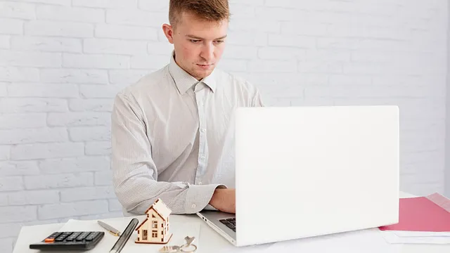realtor using laptop