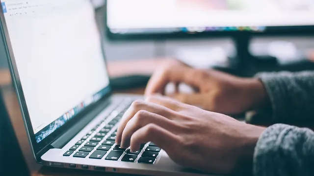 man using laptop