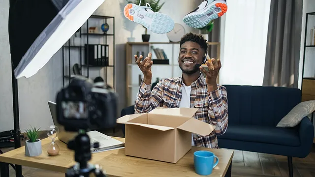 man recording a video